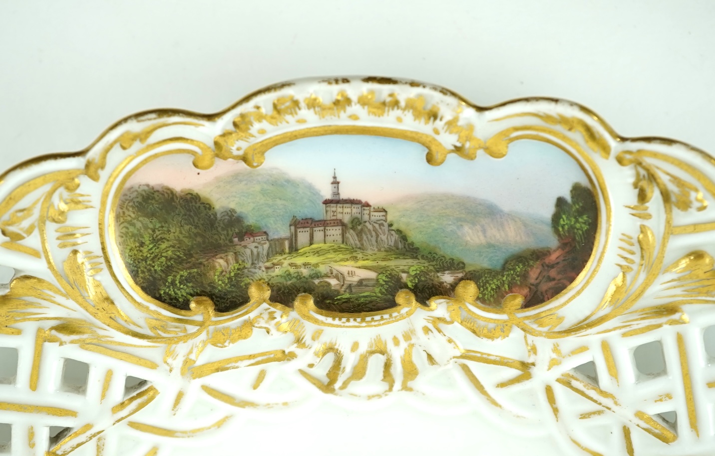 A Meissen topographical reticulated dresser plate, 19th century